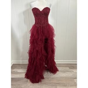 Prom Bay size 6 prom dress in the color wine. Corset with Lace up back & Ruffles